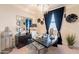 Modern office space with sleek desk, decorative mirror, and stylish furnishings at 13568 N 144Th Dr, Surprise, AZ 85379