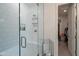 Modern glass shower with a built-in bench and tiled surround provides a relaxing bathing experience at 13568 N 144Th Dr, Surprise, AZ 85379