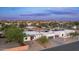 Community aerial view showcasing a modern home with desert landscaping in an upscale neighborhood at 14025 N 11Th Pl, Phoenix, AZ 85022