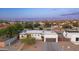 Aerial shot of a modern home featuring desert landscaping and convenient garage access at 14025 N 11Th Pl, Phoenix, AZ 85022