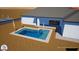 Backyard pool with umbrellas, surrounded by desert landscaping at 14025 N 11Th Pl, Phoenix, AZ 85022