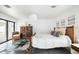 Bedroom featuring a wooden bed frame, concrete floors, and sliding glass doors to access the backyard patio at 14025 N 11Th Pl, Phoenix, AZ 85022