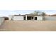 Modern home with flat roof, neutral stucco and minimalist desert landscaping at 14025 N 11Th Pl, Phoenix, AZ 85022