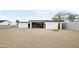 Modern home with flat roof, neutral stucco and minimalist desert landscaping at 14025 N 11Th Pl, Phoenix, AZ 85022