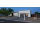 Front exterior showcasing modern architecture, desert landscaping, and an attached garage at 14025 N 11Th Pl, Phoenix, AZ 85022