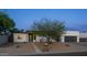 Home exterior with a modern design, desert landscape, and a path to the front door at 14025 N 11Th Pl, Phoenix, AZ 85022