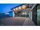 Open patio area with covered space, ceiling fan, and sliding glass doors leading inside the home at 14025 N 11Th Pl, Phoenix, AZ 85022