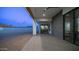 Covered patio area featuring a ceiling fan and sliding glass doors that open up to the interior at 14025 N 11Th Pl, Phoenix, AZ 85022