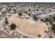 Spacious park featuring shaded picnic areas, playground, and large open space, perfect for community recreation at 14474 W Lexington Ave, Goodyear, AZ 85395