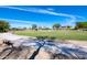 Scenic park pathway lined with mature trees and lush greenery, perfect for walking, running, and relaxing at 14474 W Lexington Ave, Goodyear, AZ 85395