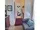 View into bathroom showing a toilet, rug, and sink at 1455 W Posada Ave, Mesa, AZ 85202