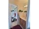 Well-maintained bathroom with vanity, mirror, decor, and shower with glass door at 1455 W Posada Ave, Mesa, AZ 85202
