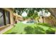Lush backyard with artificial turf and a sparkling pool at 1544 N Rico Cir, Mesa, AZ 85213