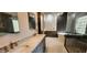 Bathroom featuring double sinks, free standing tub, glass enclosed shower, and modern finishes at 1544 N Rico Cir, Mesa, AZ 85213