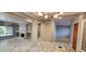 Open living area features marble floors, fireplace, neutral paint, and views to outside space at 1544 N Rico Cir, Mesa, AZ 85213