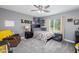 Tastefully decorated bedroom features calming colors, ceiling fan, and soft natural light at 15802 N 50Th Dr, Glendale, AZ 85306