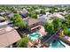 Spacious home featuring a pool, sport court, well-maintained yard and solar panels at 16626 W Baden Ave, Goodyear, AZ 85338
