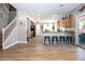 Open floor plan kitchen with modern appliances, granite countertops, and tile flooring at 16626 W Baden Ave, Goodyear, AZ 85338