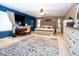 Large main bedroom features neutral decor, ceiling fan, and private desk area at 16626 W Baden Ave, Goodyear, AZ 85338