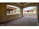 Covered patio with brick flooring providing great space for outdoor entertaining at 16868 W Earll Dr, Goodyear, AZ 85395