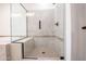 Modern shower with glass enclosure and tile surround at 16868 W Earll Dr, Goodyear, AZ 85395