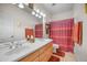 A spacious bathroom with double sinks and a large mirror at 18037 N 14Th Pl, Phoenix, AZ 85022