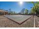 Outdoor basketball court featuring a hoop and painted lines for recreational games and activities at 1917 S Rock Ct, Gilbert, AZ 85295
