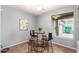 Bright dining area with modern furnishings and gray paint, offering an inviting space for meals at 1917 S Rock Ct, Gilbert, AZ 85295