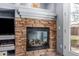 Close-up of a traditional fireplace with stone surround at 1917 S Rock Ct, Gilbert, AZ 85295