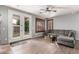 Bright living room offering ample natural light, comfortable seating, and serene backyard views at 1917 S Rock Ct, Gilbert, AZ 85295