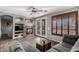 Comfortable living room with a cozy fireplace, stylish decor, and ample seating at 1917 S Rock Ct, Gilbert, AZ 85295