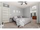 Bedroom with neutral carpet and decor, along with an ensuite bath at 1917 S Rock Ct, Gilbert, AZ 85295