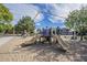 Community playground with slides, swings, and climbing structures for recreational activities and Gathering fun at 1917 S Rock Ct, Gilbert, AZ 85295