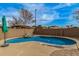 Refreshing pool surrounded by lush landscaping and a charming gazebo, creating a tranquil backyard oasis at 1917 S Rock Ct, Gilbert, AZ 85295