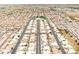 An aerial view shows the well-planned neighborhood with uniform homes and neatly paved streets at 2101 S Meridian Rd # 354, Apache Junction, AZ 85120