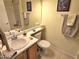 Bright bathroom features a neutral palette with white tile flooring and sink at 2101 S Meridian Rd # 354, Apache Junction, AZ 85120
