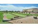 Scenic bocce ball court surrounded by lush landscaping, and inviting seating at 2101 S Meridian Rd # 354, Apache Junction, AZ 85120
