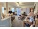 Comfortable living room filled with natural light, neutral colors, and plush carpeting at 2101 S Meridian Rd # 354, Apache Junction, AZ 85120