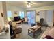 Cozy living room offers a comfortable seating area and a view to the backyard at 2101 S Meridian Rd # 354, Apache Junction, AZ 85120