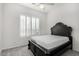 This bedroom offers a lovely space with a ceiling fan and lots of natural light at 2109 N Nancy Ln, Casa Grande, AZ 85122