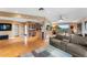 Open-concept living area with hardwood floors, neutral tones, and abundant natural light throughout at 2260 E Palmaire Ave, Phoenix, AZ 85020