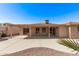 The covered patio is perfect for relaxing and entertaining year-round at 26421 S New Town Dr, Sun Lakes, AZ 85248