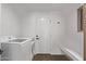 Clean laundry room with new washer and dryer at 26421 S New Town Dr, Sun Lakes, AZ 85248
