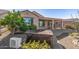Hot tub in the back yard with vegetation at 26880 W Sierra Pinta Dr, Buckeye, AZ 85396