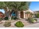 Charming home featuring a well-manicured front yard and covered entrance at 26880 W Sierra Pinta Dr, Buckeye, AZ 85396