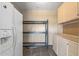 Pantry features include shelving and cabinets, refrigerator and ample storage, and space for dry goods at 26880 W Sierra Pinta Dr, Buckeye, AZ 85396