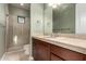 Bathroom showcasing a glass door shower with neutral tile at 31409 N 166Th Pl, Scottsdale, AZ 85262
