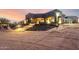 View of modern home featuring desert landscaping and impressive curb appeal at 31409 N 166Th Pl, Scottsdale, AZ 85262