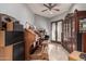 Elegant living room featuring a classic organ, tile floors, and access to the outdoors at 31409 N 166Th Pl, Scottsdale, AZ 85262