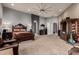 A luxurious primary bedroom showcasing ample space, a large bed, and classic furnishings at 31409 N 166Th Pl, Scottsdale, AZ 85262